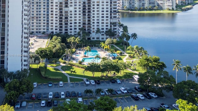 birds eye view of property featuring a water view