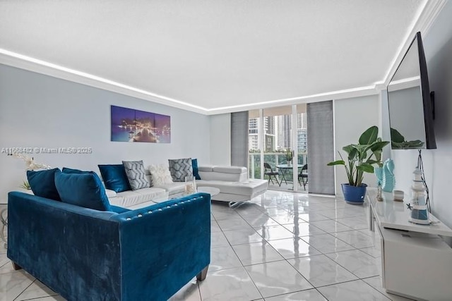 living room featuring floor to ceiling windows