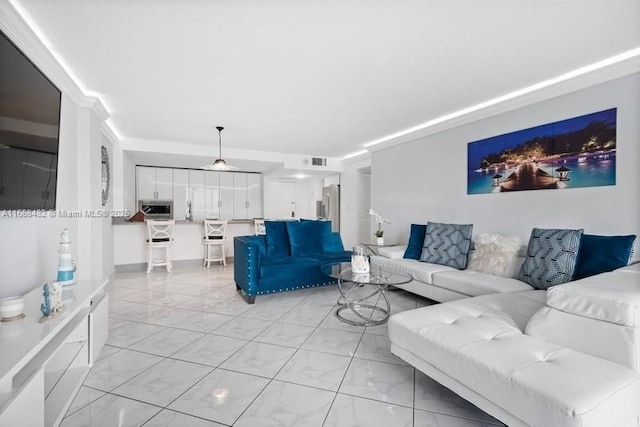 living room featuring visible vents