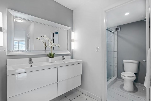 full bath with double vanity, a sink, toilet, and a stall shower