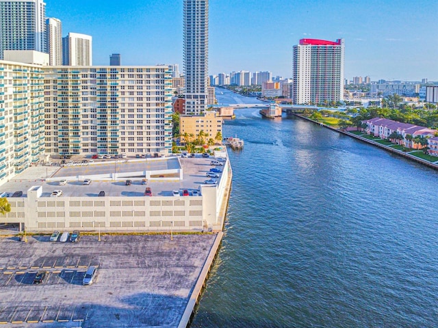 aerial view with a view of city and a water view