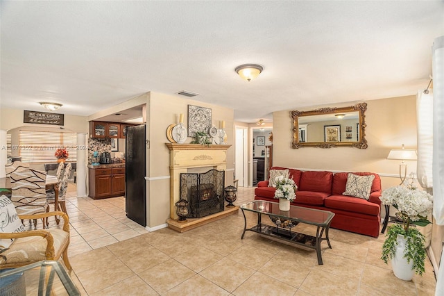 living room with light tile patterned flooring