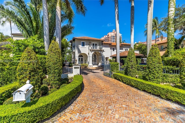 view of front of property with a balcony