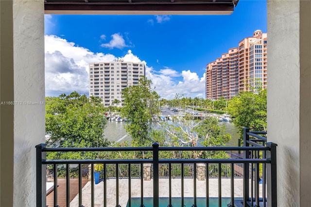 balcony featuring a water view