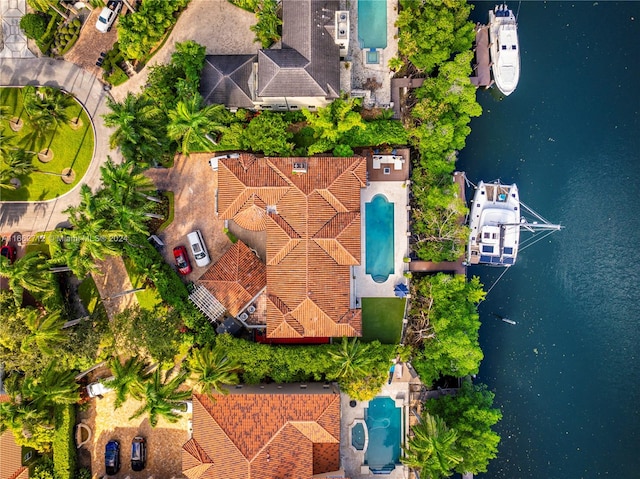 bird's eye view with a water view