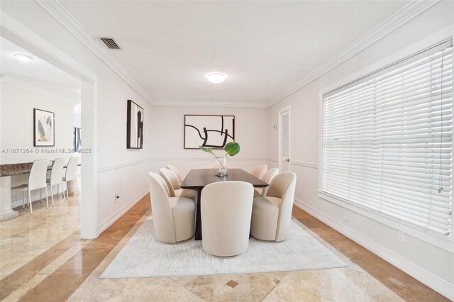 living room featuring decorative columns, french doors, light hardwood / wood-style floors, and a textured ceiling