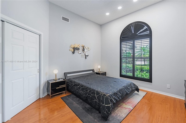 bedroom featuring hardwood / wood-style floors