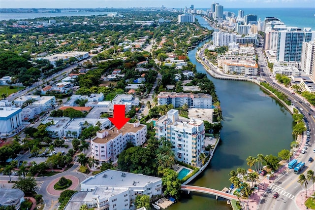 drone / aerial view with a water view