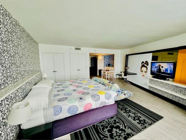 bedroom featuring hardwood / wood-style floors