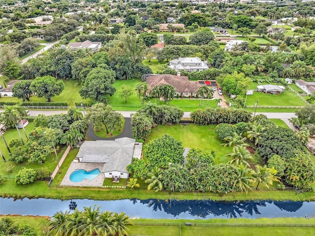 bird's eye view with a water view