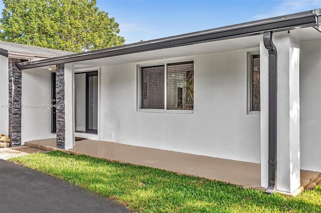 11811 NW 5th Ct, Plantation, FL 33325 - view of side of home with stucco siding