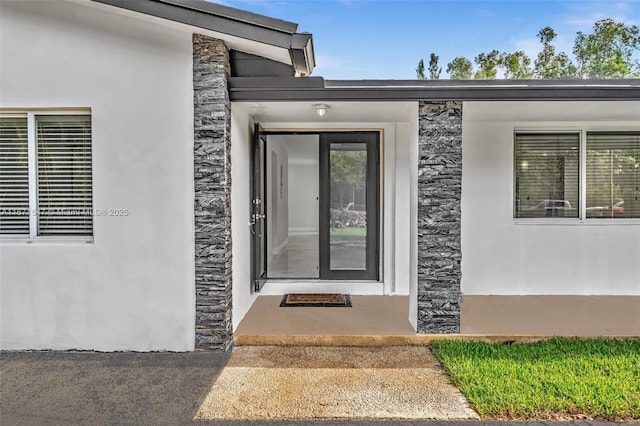 11811 NW 5th Ct, Plantation, FL 33325 - property entrance with stone siding and stucco siding