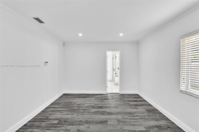 11811 NW 5th Ct, Plantation, FL 33325 - empty room with plenty of natural light, ornamental molding, dark wood-type flooring, recessed lighting, and baseboards