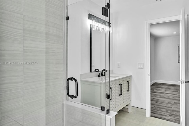 11811 NW 5th Ct, Plantation, FL 33325 - bathroom with double vanity, a shower stall, and baseboards