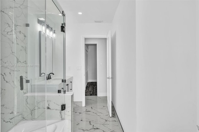 11811 NW 5th Ct, Plantation, FL 33325 - bathroom with marble tiled flooring, a marble finish shower, recessed lighting, vanity, and baseboards
