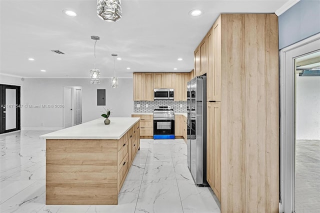 kitchen with light brown cabinetry, decorative light fixtures, a center island, and appliances with stainless steel finishes