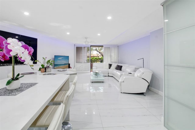 living room with ceiling fan