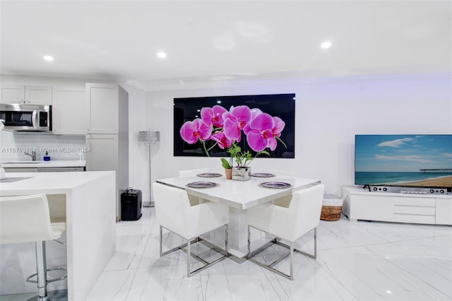 dining room featuring sink