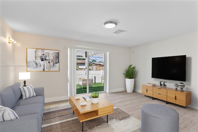 living room with wood-type flooring