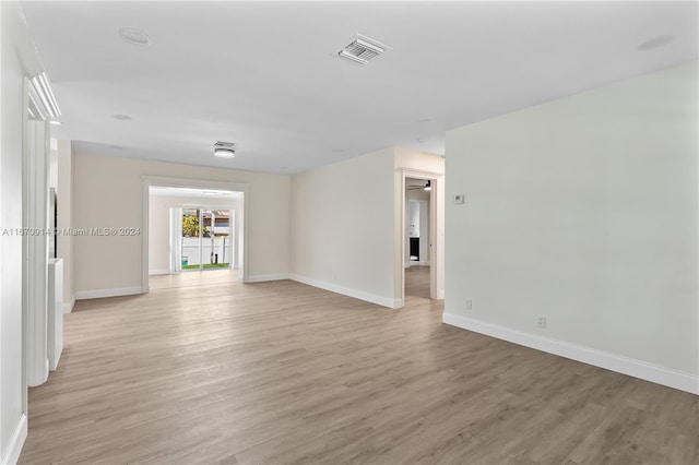 empty room with light wood-type flooring