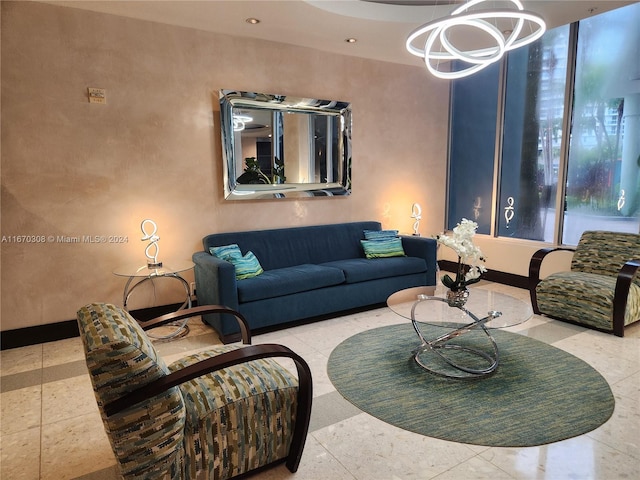 living room with an inviting chandelier