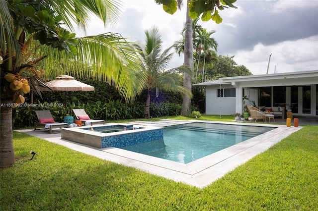 view of swimming pool with a lawn, an in ground hot tub, and a patio area