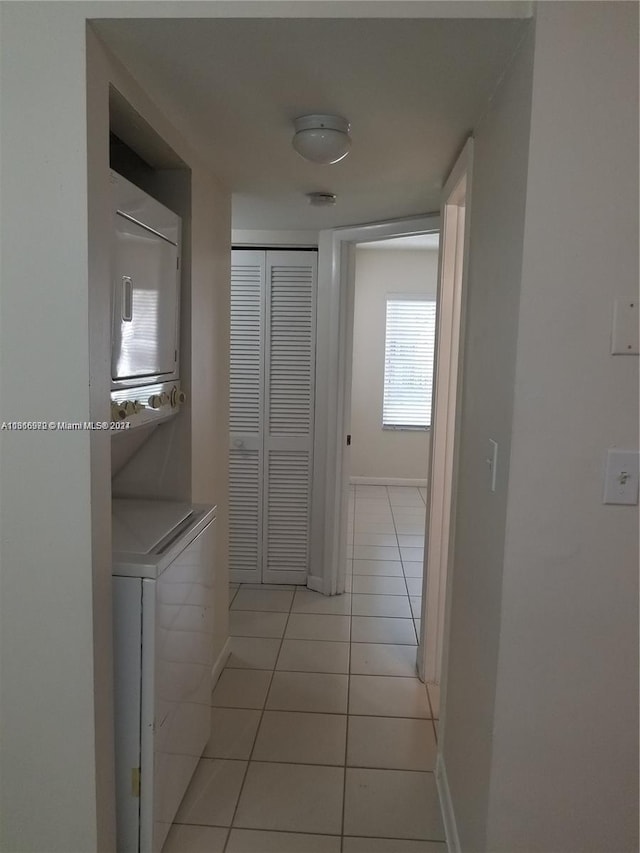 corridor with light tile patterned floors