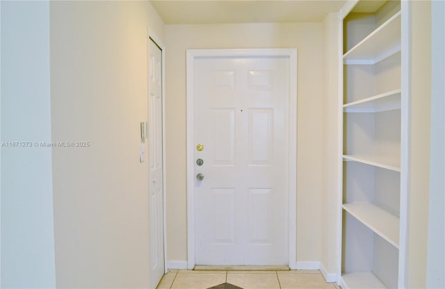 3225 NE 184th St Unit 10103, Aventura, FL 33160 - doorway featuring light tile patterned floors and baseboards