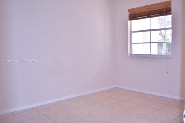 empty room with baseboards