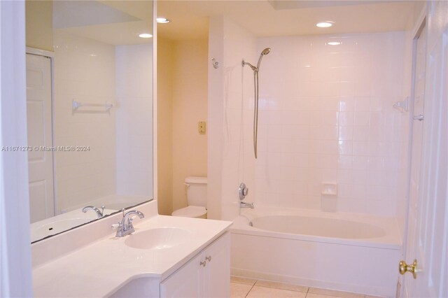 bathroom with vanity, toilet, bathtub / shower combination, recessed lighting, and tile patterned floors