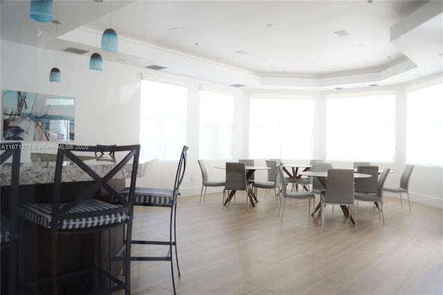 3225 NE 184th St Unit 10103, Aventura, FL 33160 - dining room featuring a raised ceiling and wood finished floors