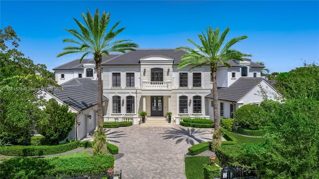 view of front of home with a balcony