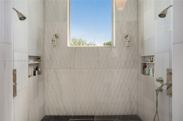 bathroom featuring tiled shower