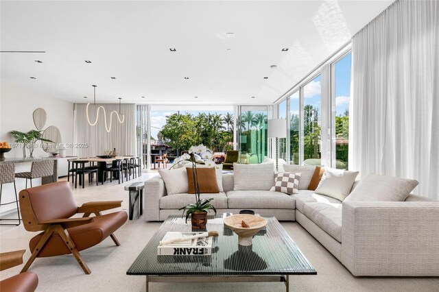 living room featuring a wall of windows