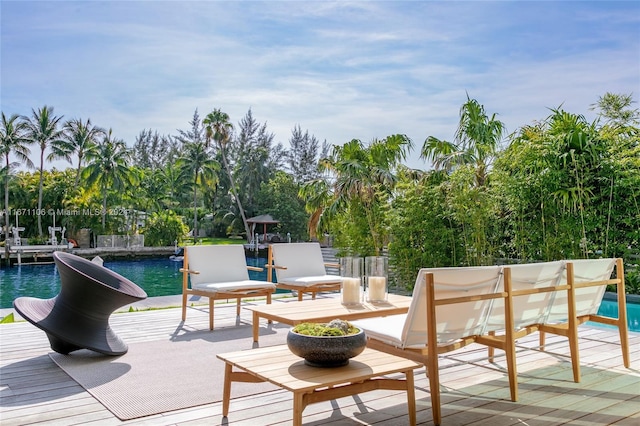 wooden terrace with a water view