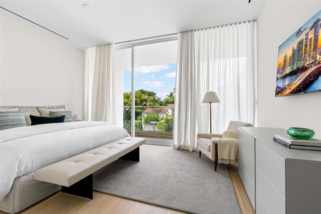 bedroom with light wood-type flooring