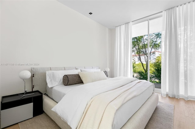 bedroom featuring light wood-type flooring