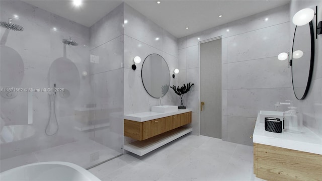 bathroom with vanity and tile walls