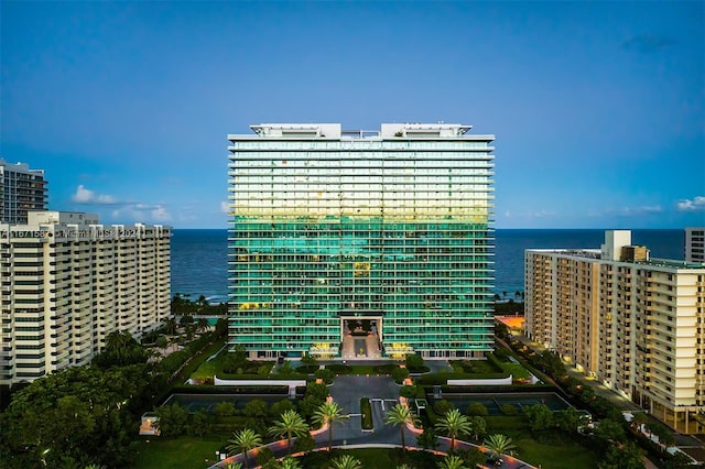 view of building exterior featuring a water view