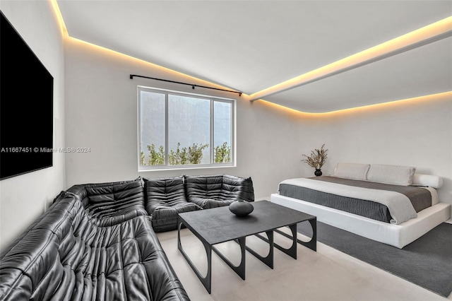 bedroom with lofted ceiling