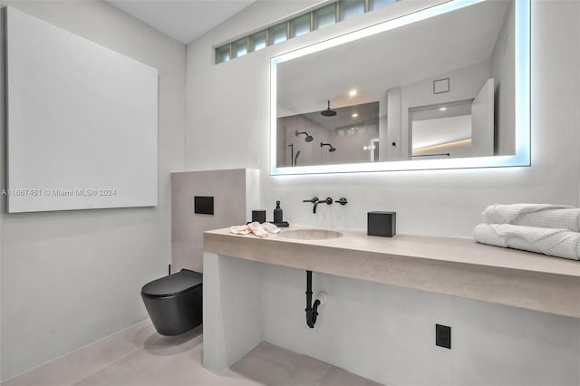 bathroom with a shower, toilet, sink, and tile patterned floors