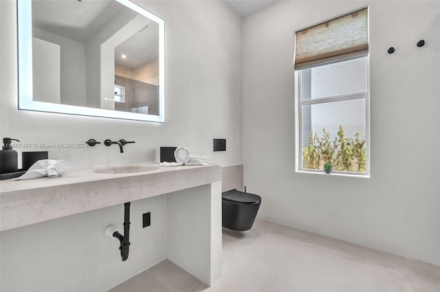 bathroom with tile patterned floors, vanity, and toilet