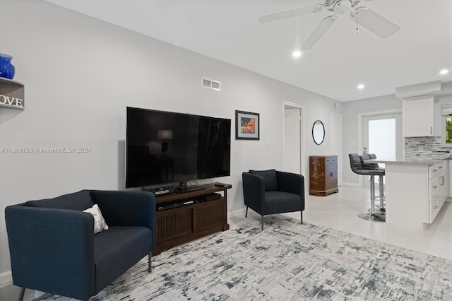 living room featuring ceiling fan