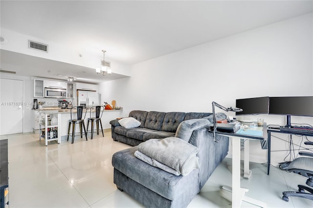 living room featuring light tile patterned floors