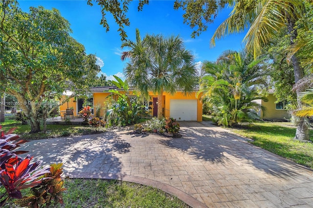 view of front of property with a garage