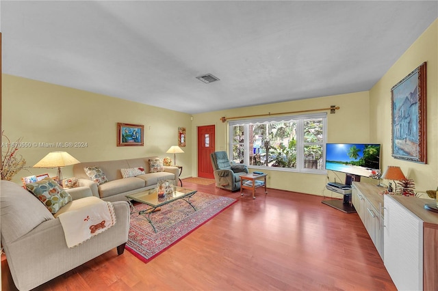 living room with hardwood / wood-style flooring