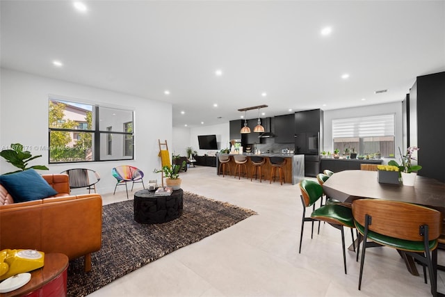 living room featuring plenty of natural light