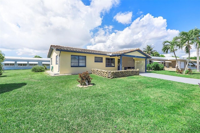 view of front of property with a front lawn