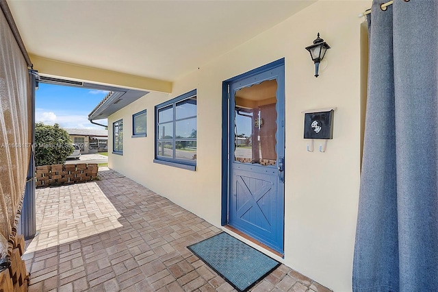 4701 Mainland Dr, Tamarac, FL 33319 - doorway to property with stucco siding