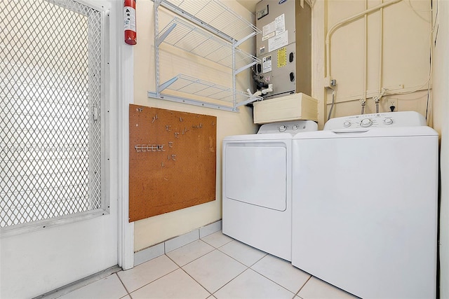 4701 Mainland Dr, Tamarac, FL 33319 - washroom featuring separate washer and dryer and light tile patterned floors